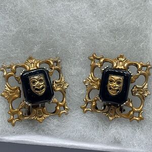 Vintage mask ornate clip earrings.
